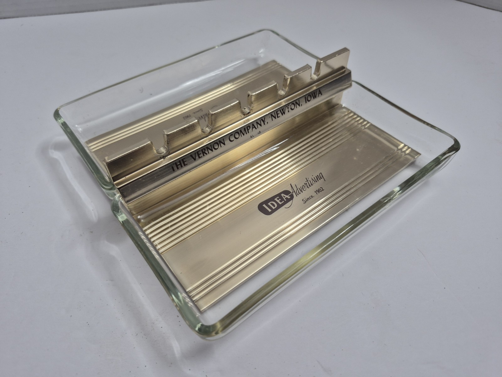 The Vernon Co Newton IA Salesman Sample VTG Advertise 2 Sided Glass Desk Ashtray