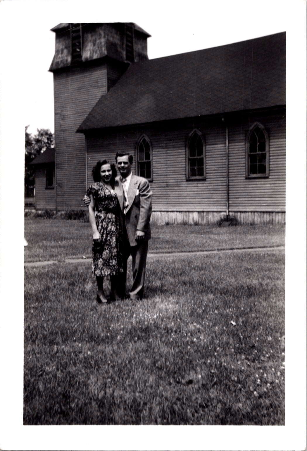 Young Couple Outside Church, 1948 B&W Snapshot Vintage Photograph