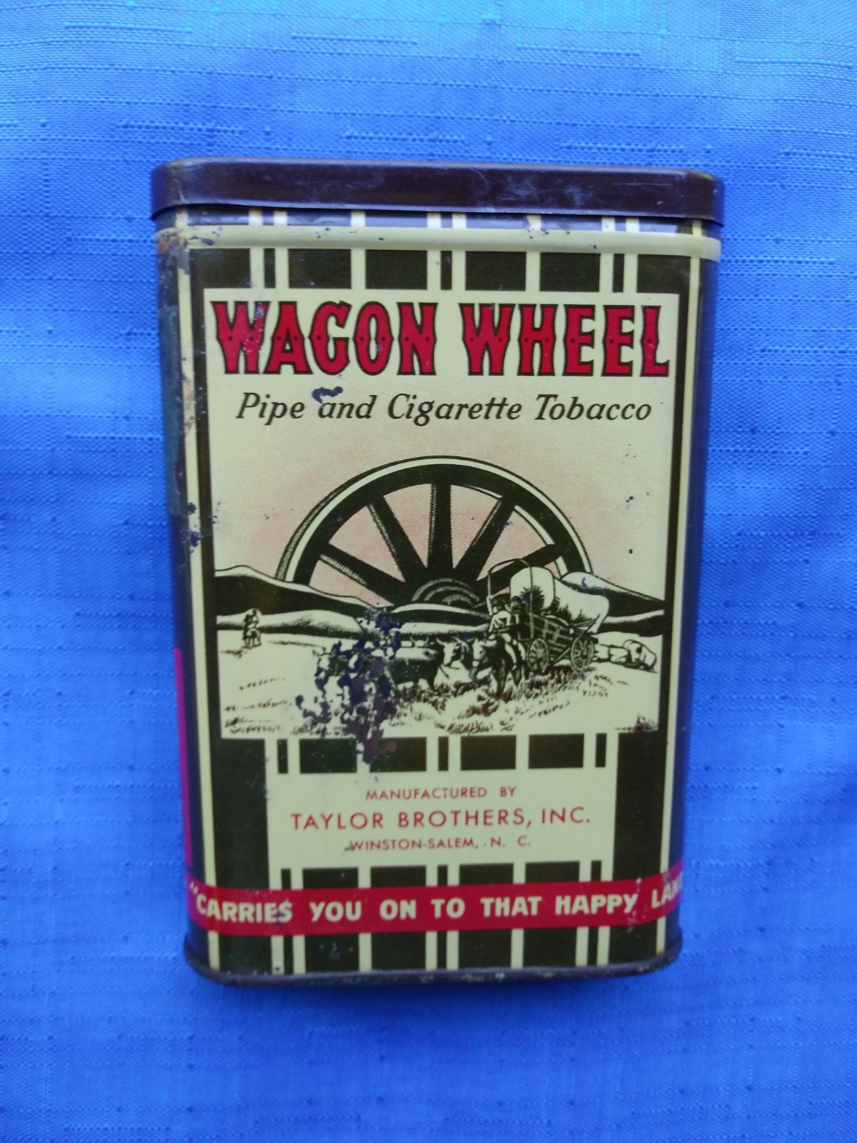 *WAGON WHEEL TOBACCO TIN   (empty).