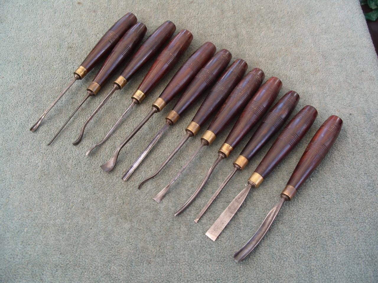 Stunning set of 12 carving chisels by Melhuish & Son, Rosewood handles.