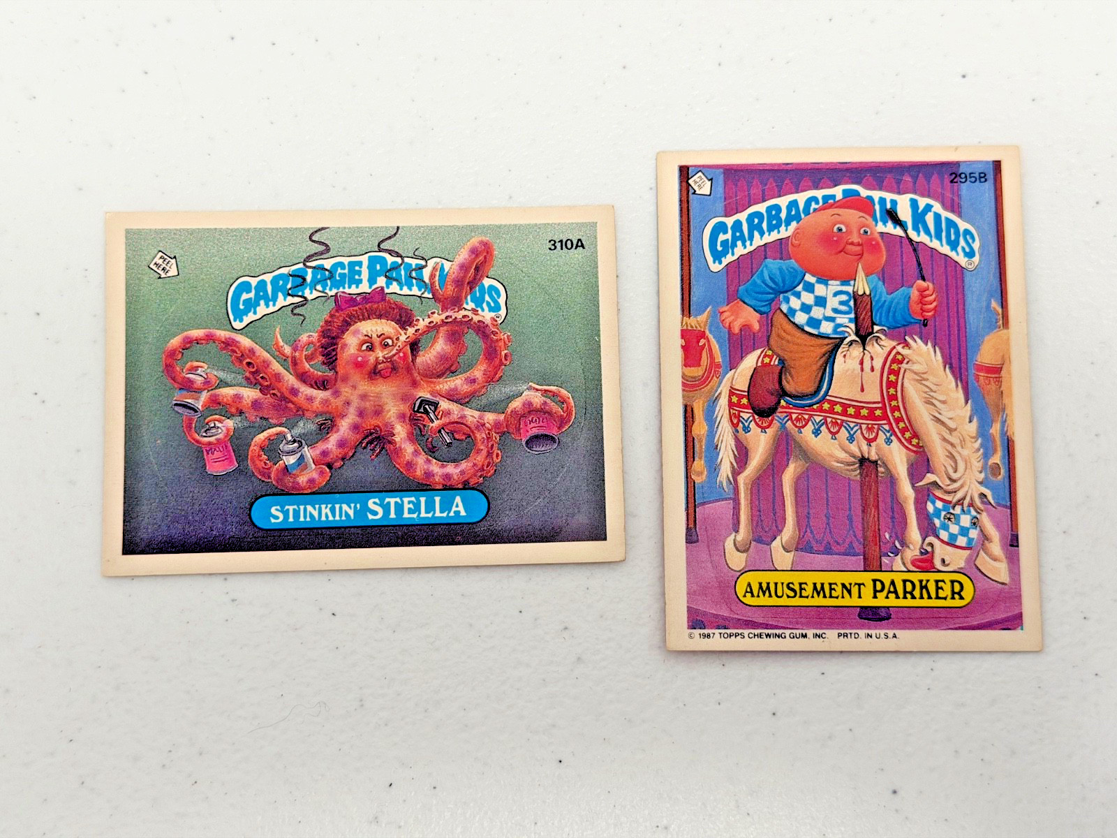 1987 TOPPS GARBAGE PAIL KIDS GPK 295B & 310A STINKIN STELLA AMUSEMENT PARKER 1987 TOPPS GARBAGE PAIL KIDS GPK 295B & 310A STINKIN STELLA AMUSEMENT PARKER