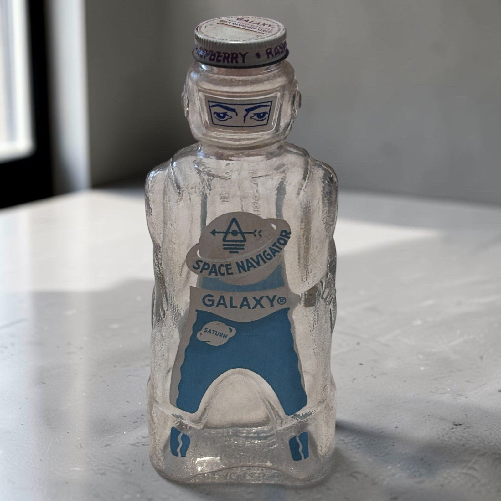 Vintage 1953 Galaxy Spaceman Syrup Bottle Bank Space Navigator Light Blue Rare