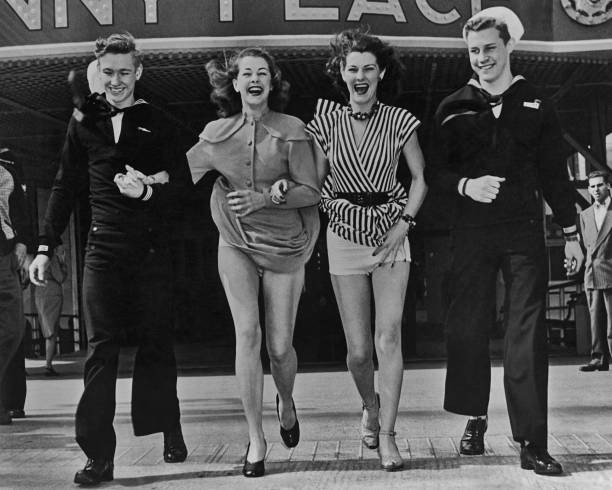 Two women their skirts blown up by wind out two sailors 1940 Old Photo