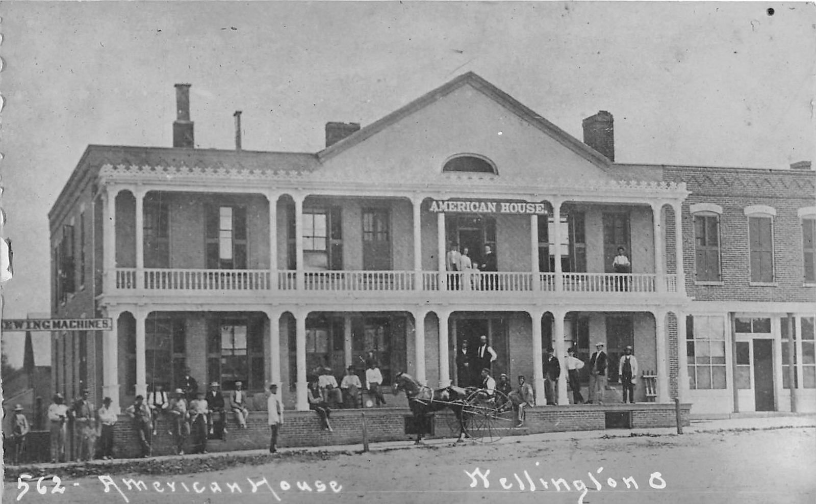 F62/ Wellington Ohio RPPC Postcard c1910 American House Hotel Building