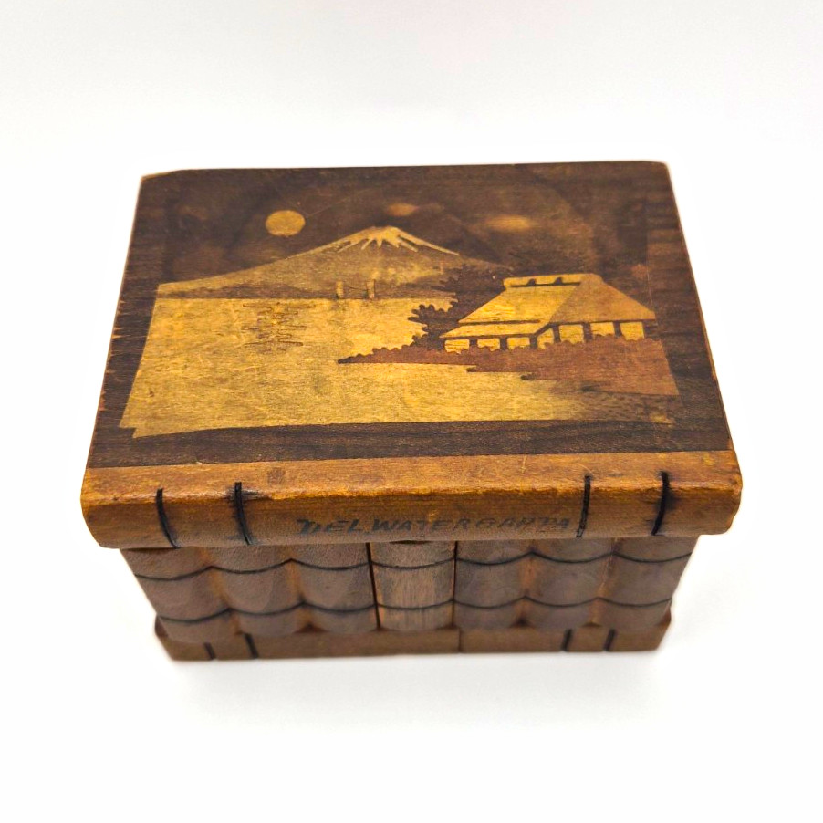 vintage Japanese puzzle box (Himitsu-Bako) design of Mount Fuji on the lid vintage Japanese puzzle box (Himitsu-Bako) design of Mount Fuji on the lid