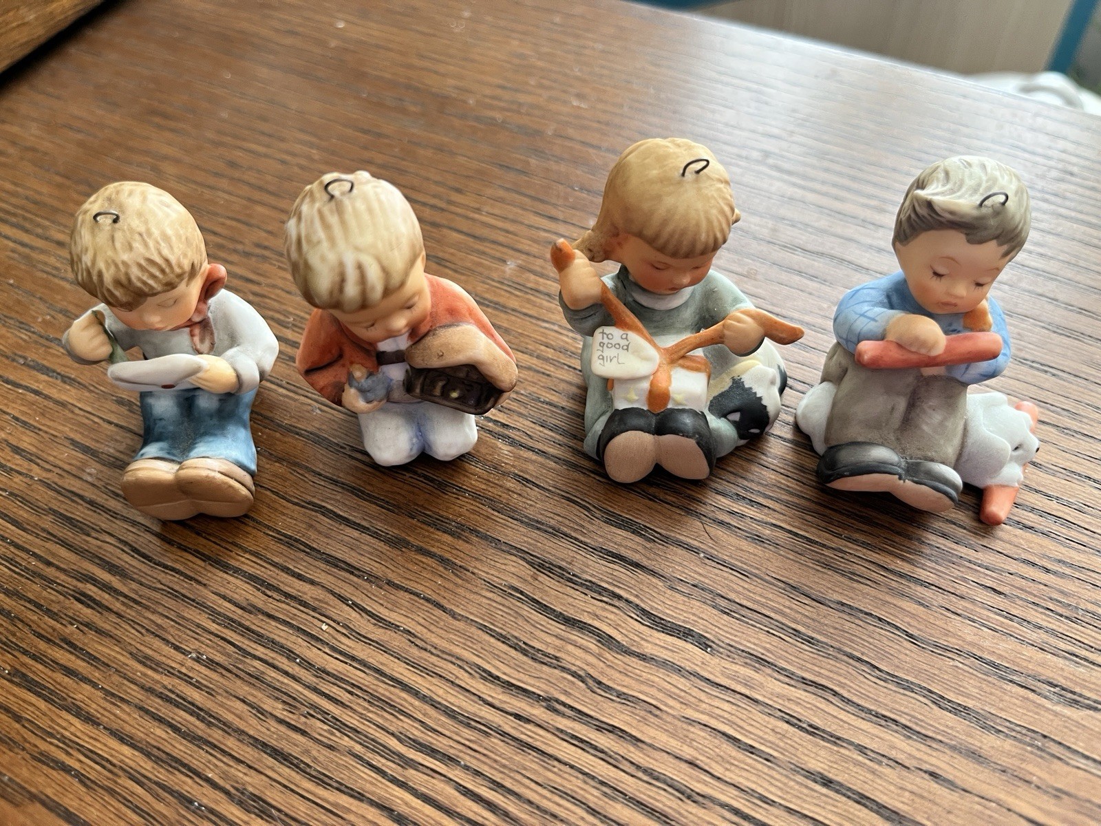 Mini Hummel ornament set includes 4 children 