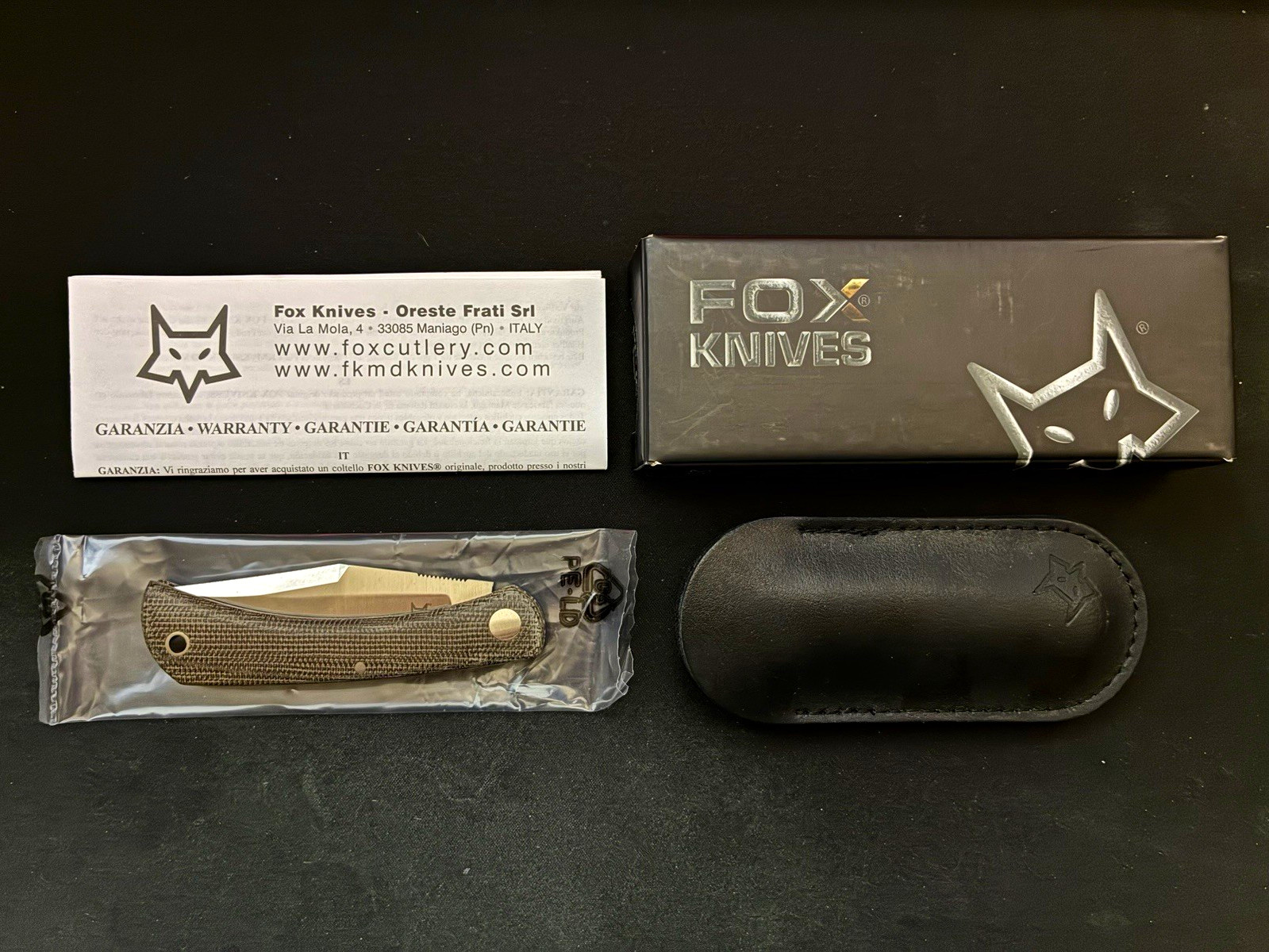 Fox Knives FX-582 Libar M390 plain edge slip joint OD green canvas Micarta knife