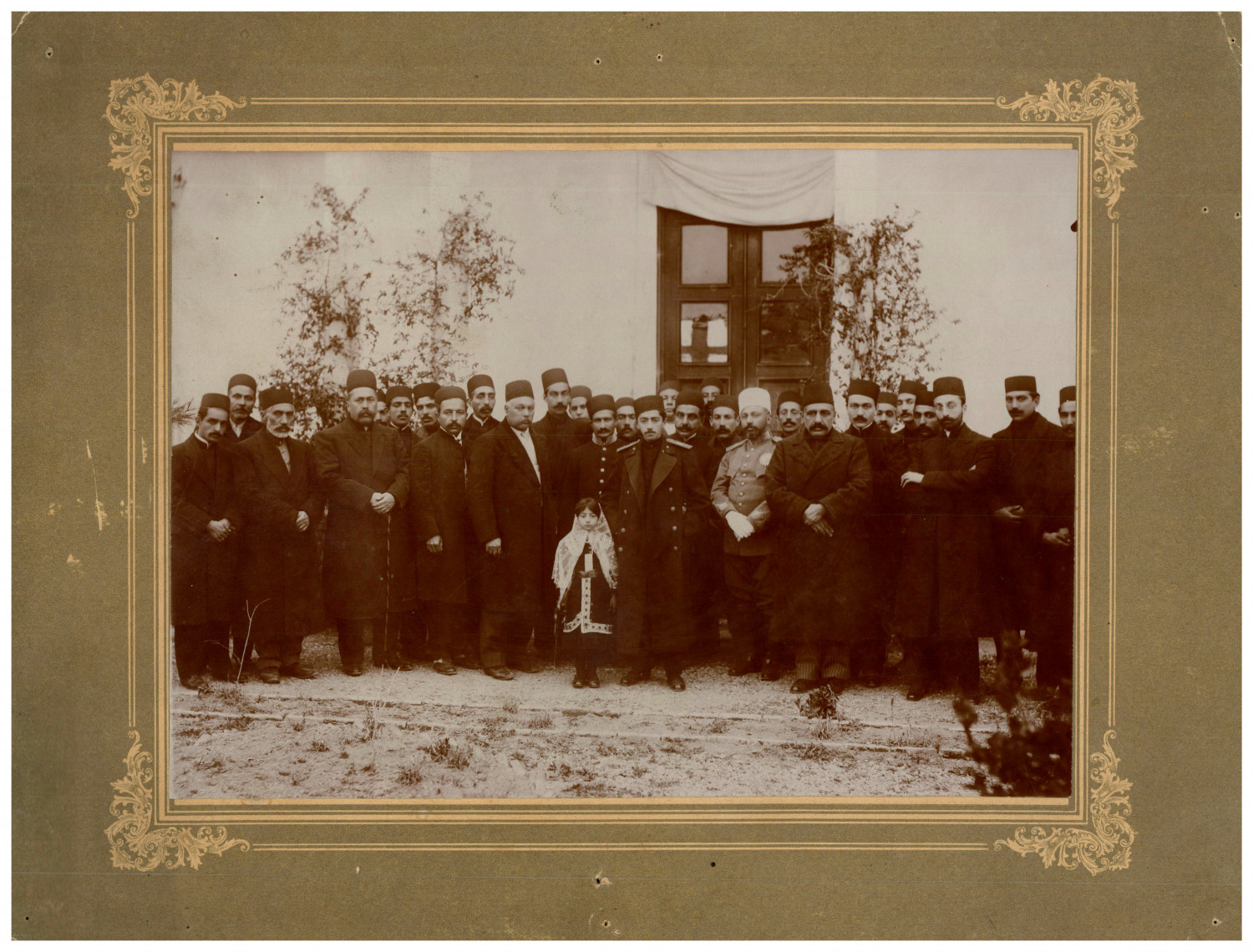  Qajar elite, group of dignitaries surrounding a child, Persia Late Qajar period