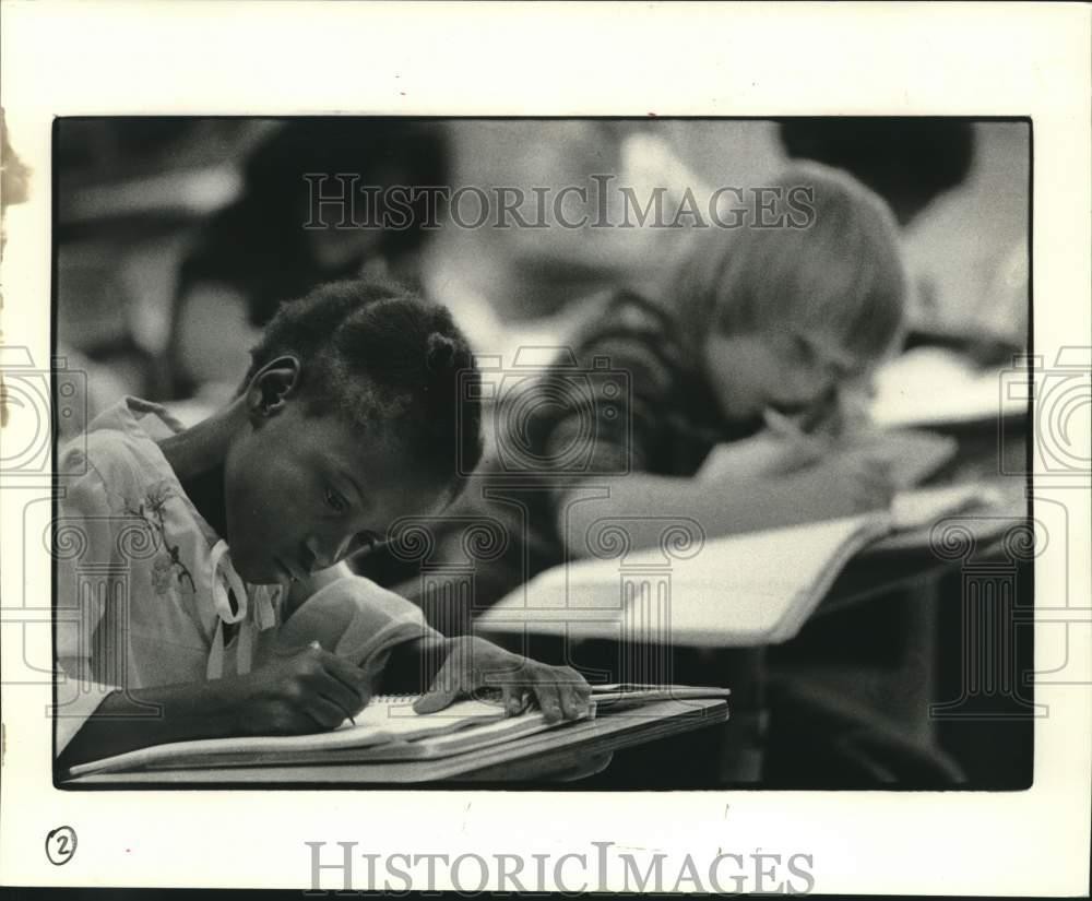 1981 Press Photo John L. Ory Elementary School student Bridget Lewis studying