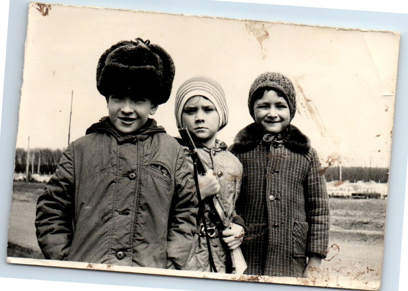 Soviet Photo Three Boys in Winter Clothes One Holding Toy Rifle Vintage