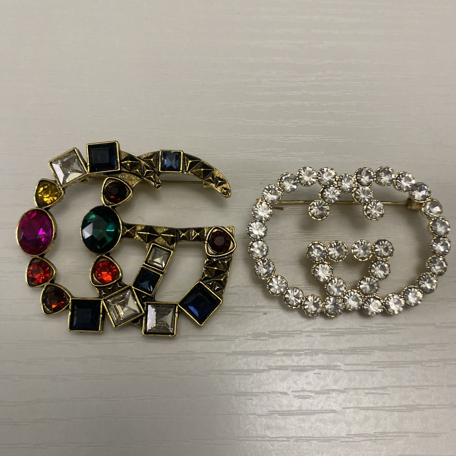 Luxury Elegant Brand Name Brooches 2 Pieces By Gucci. Luxury Elegant Brand Name Brooches 2 Pieces By Gucci.