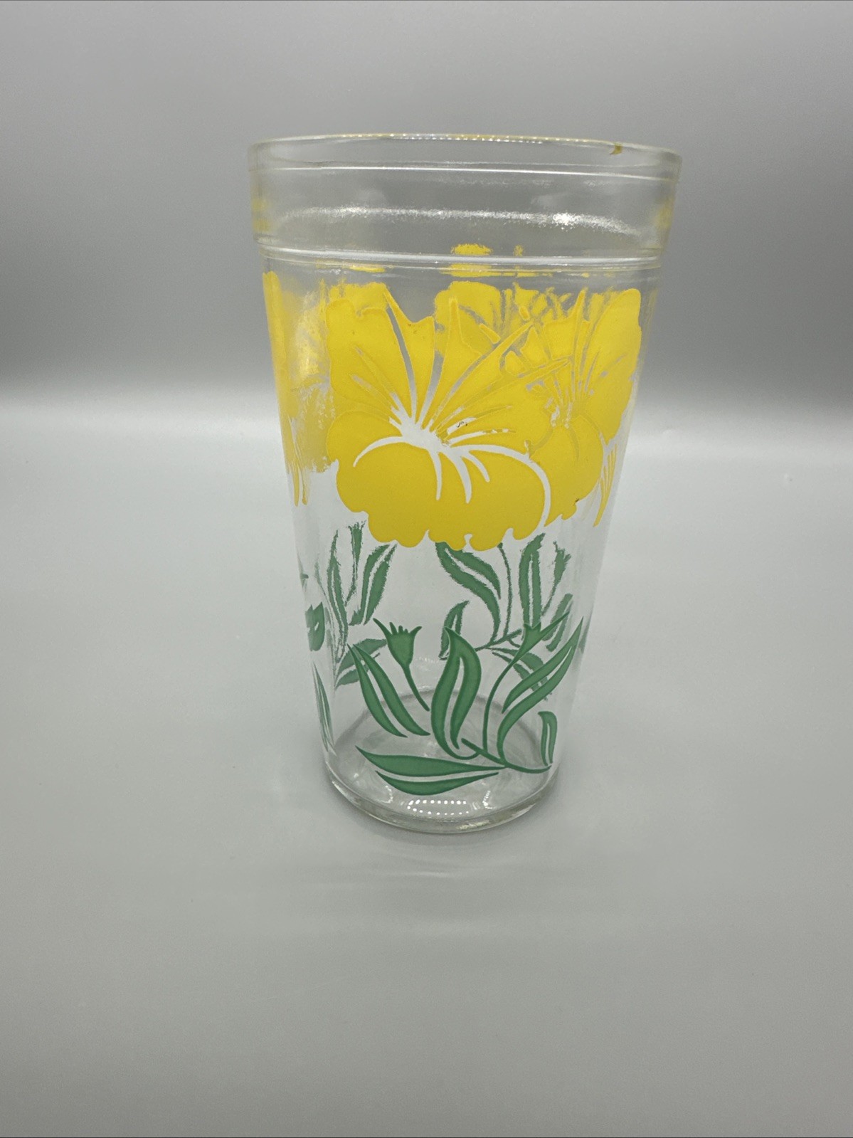 Vintage Boscul Peanut Butter glass with a vibrant Yellow Hibiscus pattern