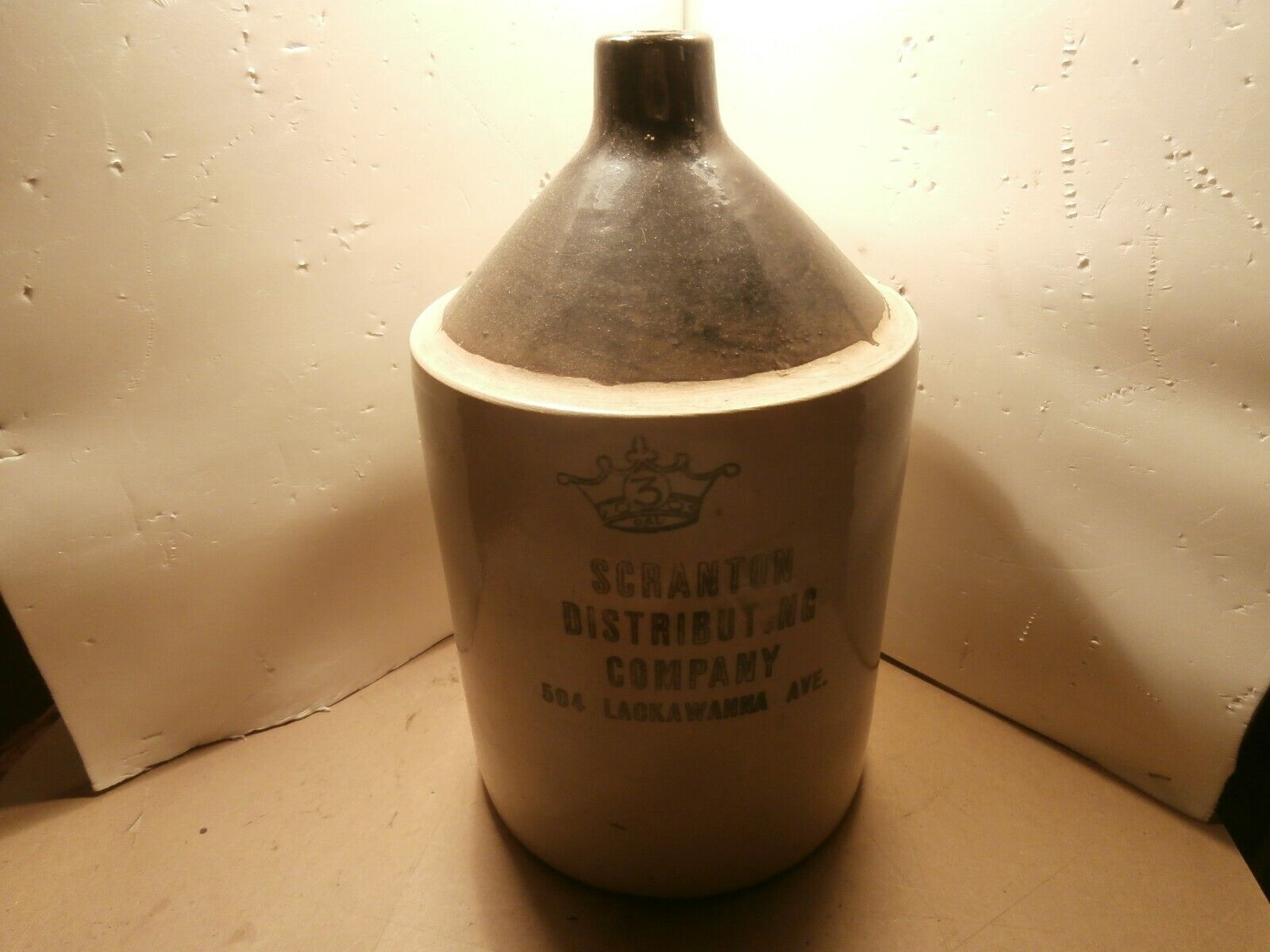 antique stoneware whiskey jug  3 gal Scranton dist.  Lackawana Ave, Scranton