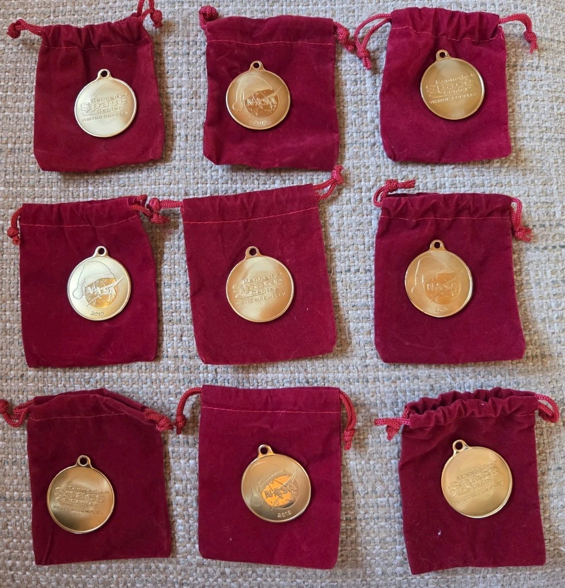 LOT of NINE 2019 Kennedy Space Center Holiday Medallion Ornaments w/ Bag, Rare