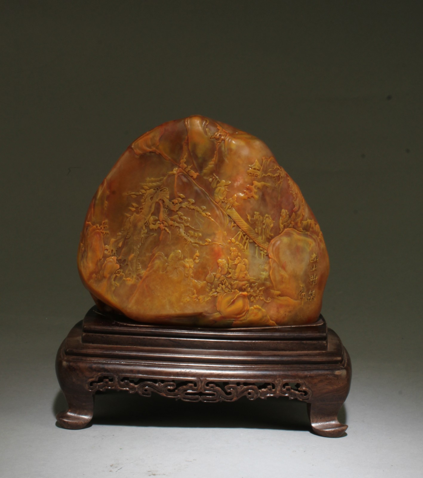 Chinese Carved Tianhuang Stone. Comes fitted with a wooden stand.