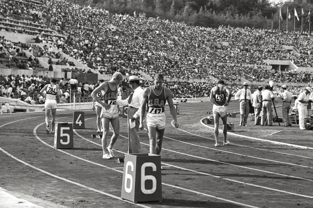 Atheltes walking along the running track Rome 1960 Historic 1960s Old Photo