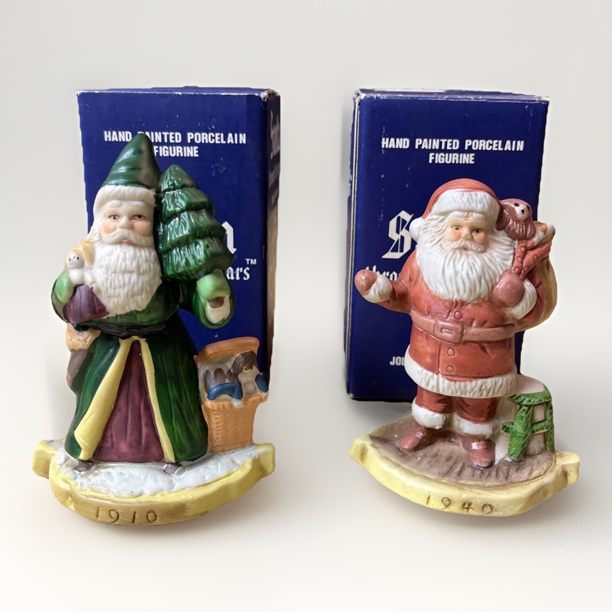 Santa Through The Years  Set of 2 Porcelain Figurines Christmas With Boxes 4”H