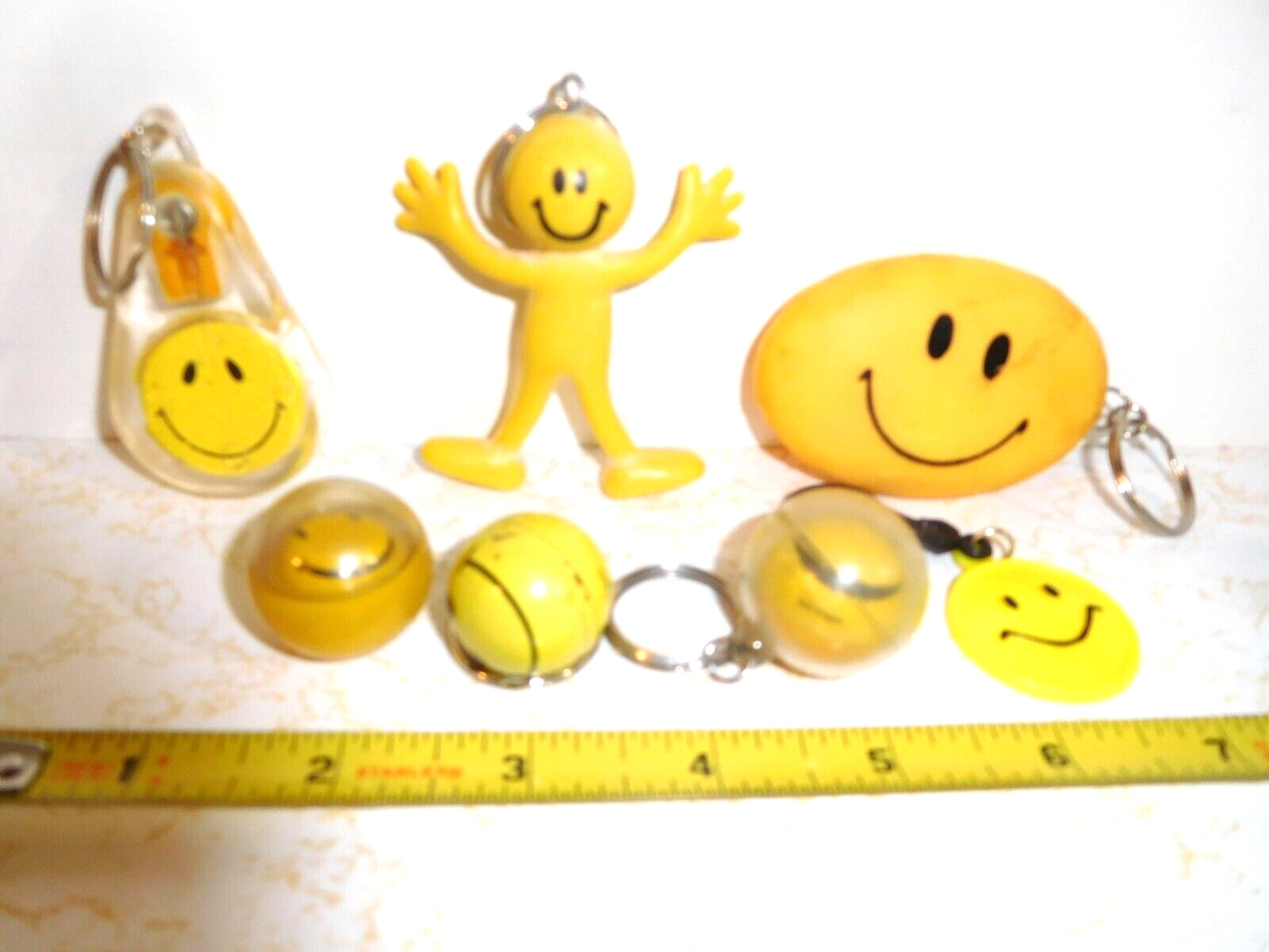 7 Vintage Round Yellow Smiley Face & Bendy Man Key Chains