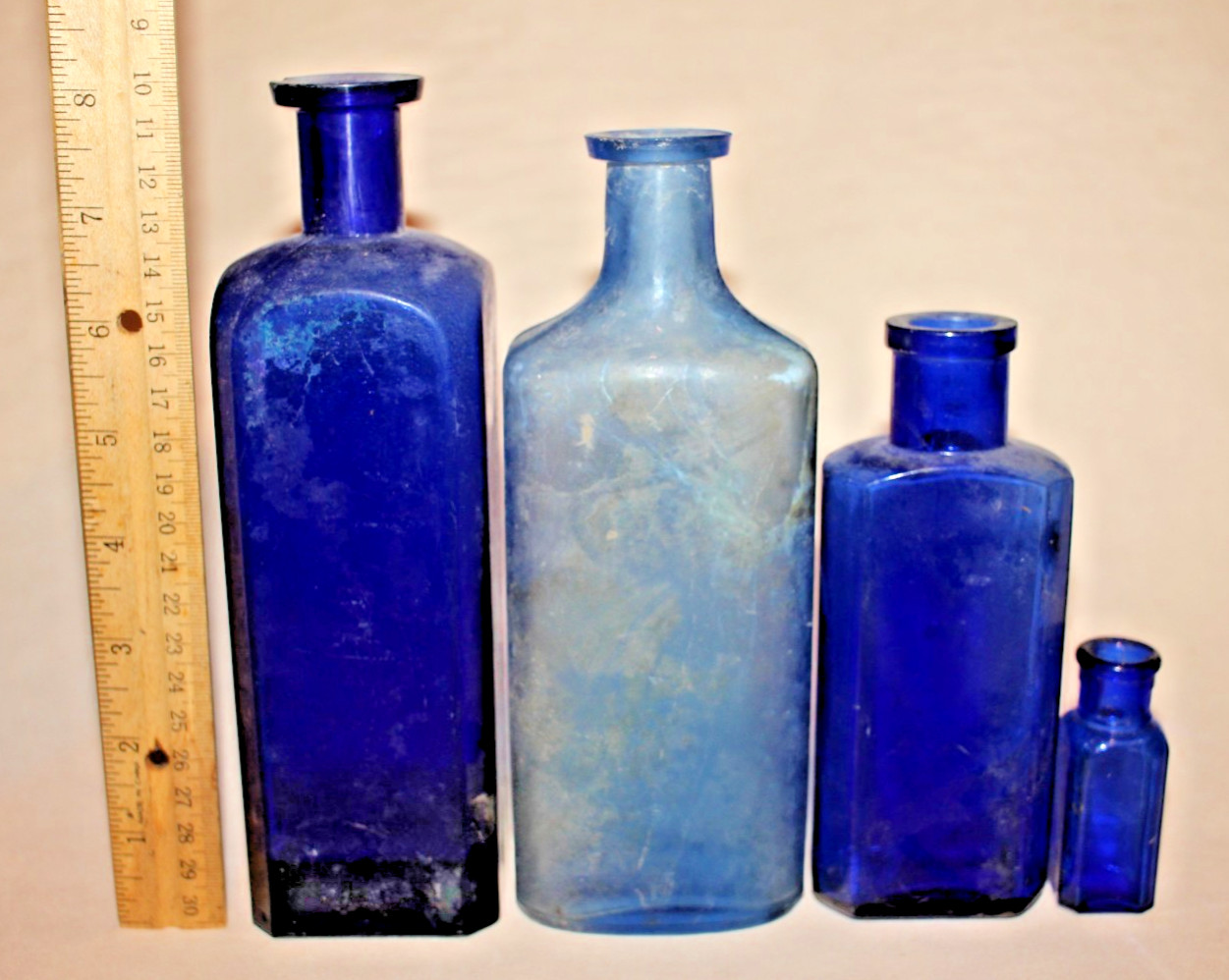 LOT OF 4 ANTIQUE 1800s COBALT BLUE MEDICINE BOTTLES 2.5 LOT OF 4 ANTIQUE 1800s COBALT BLUE MEDICINE BOTTLES 2.5