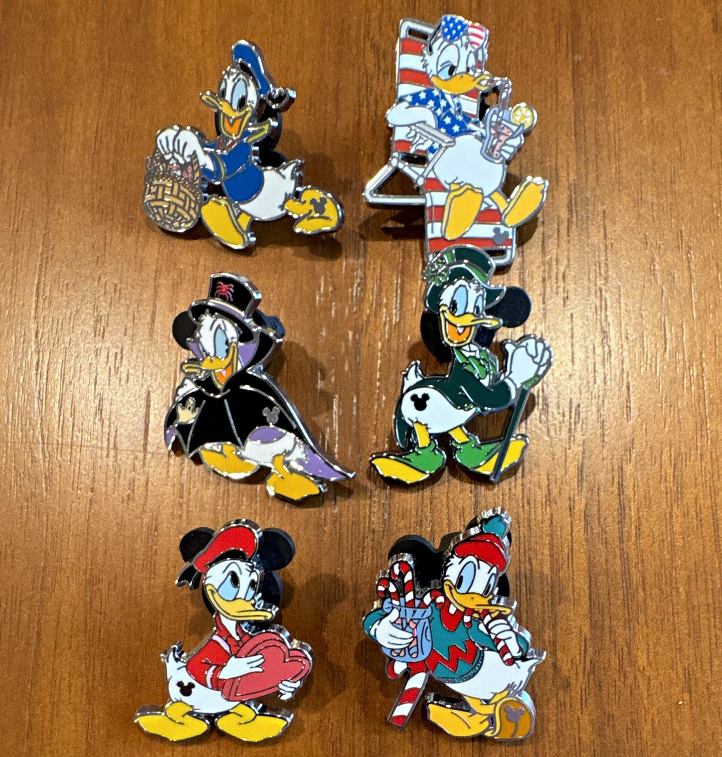 2025 WDW Wave A Donald Duck Holiday Set, including Chaser