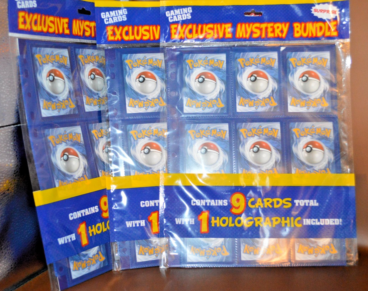 Exclusive Mystery Bundle 3 Pokémon 9 Cards w/Holographic Suprise