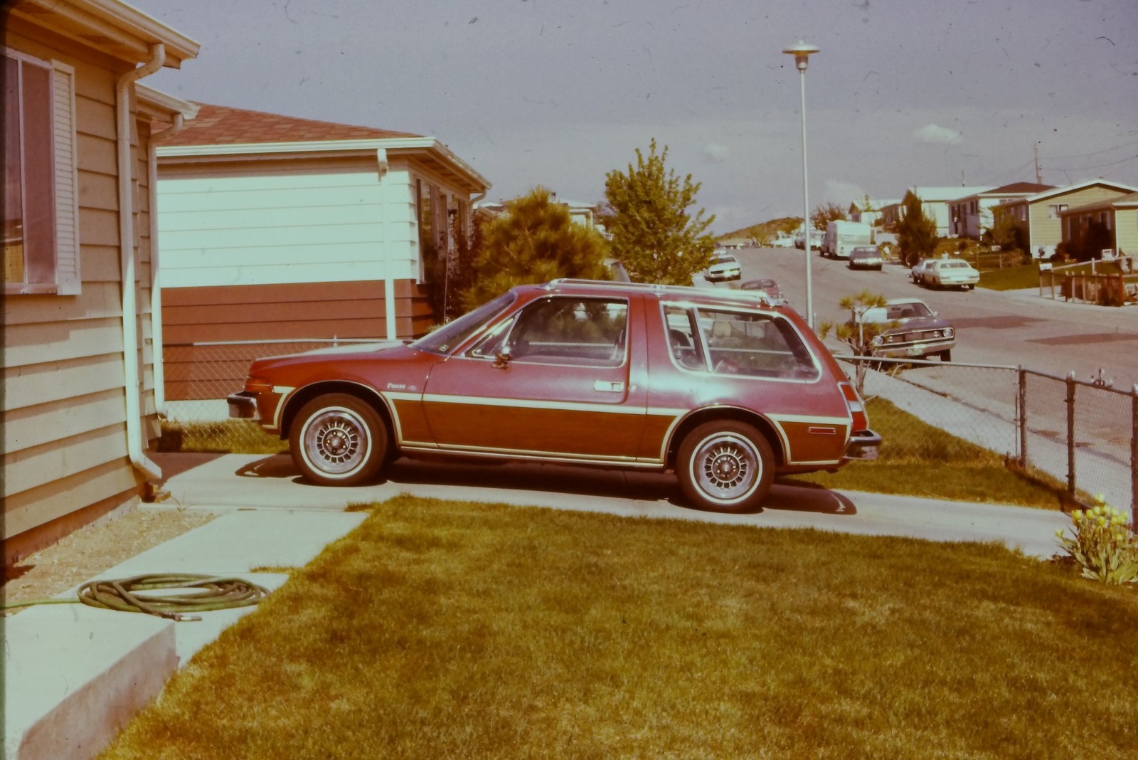 c1970\'s 35mm Slide, AMC Pacer, Suburban Street, Residential Neighborhood brown c1970\'s 35mm Slide, AMC Pacer, Suburban Street, Residential Neighborhood brown