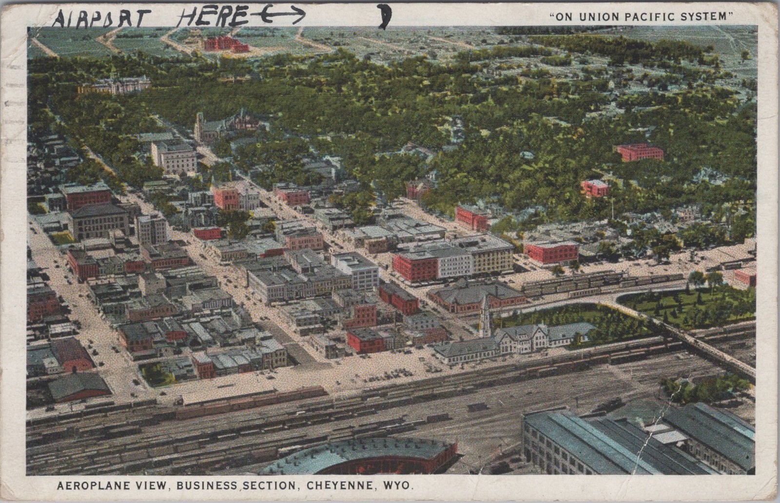 1934 Vintage Aerial view of Cheyenne’s business section and railroad Postcard