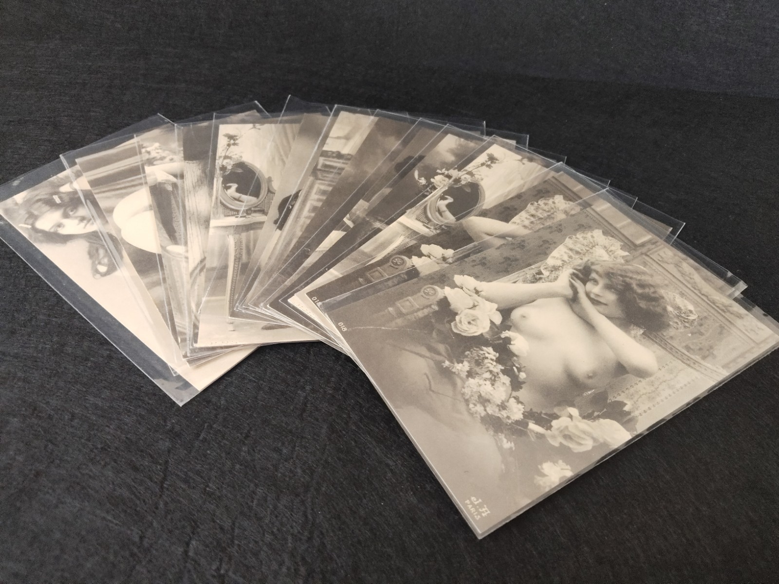Lot of 12 original vintage erotic postcards.