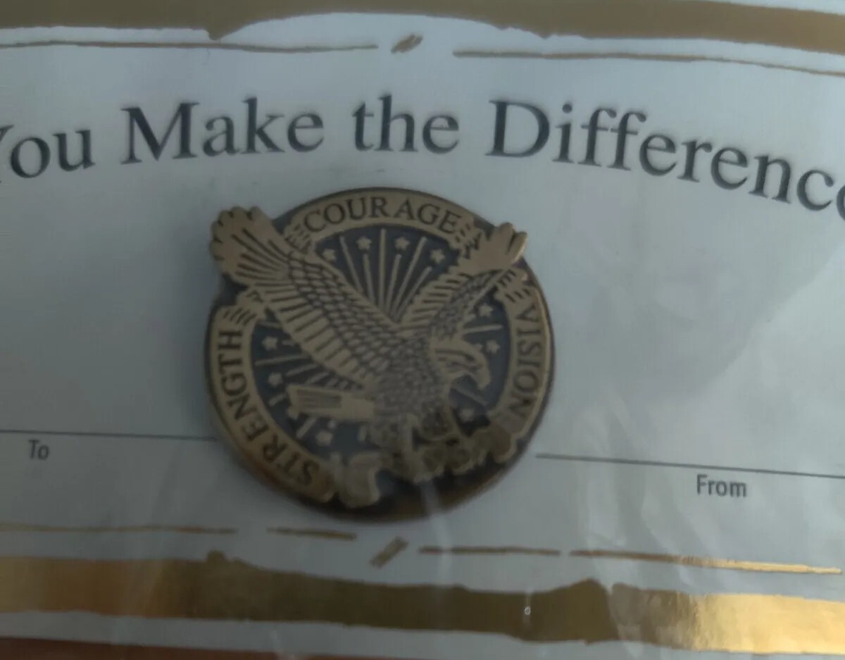 You make the difference  Lapel Baudville Inc Courage .Vision . Strength.