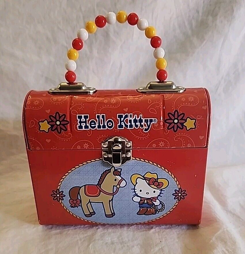 2007 Sanrio Hello Kitty Cow Girl Pony Red Tin Box Purse Paisley