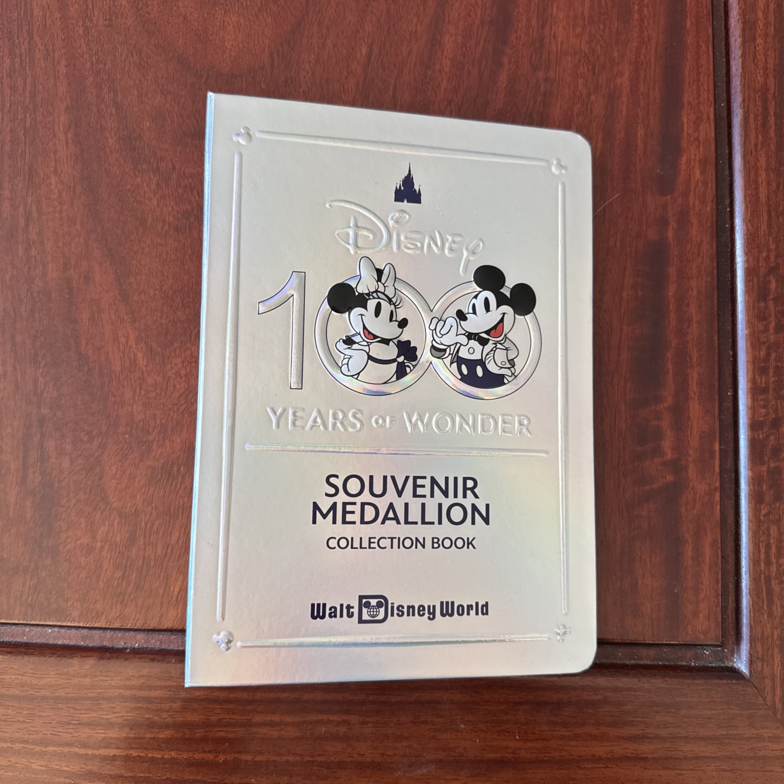 Walt Disney World 100 Year Anniversary Binder Coin Lot with 17 Coins Medallions