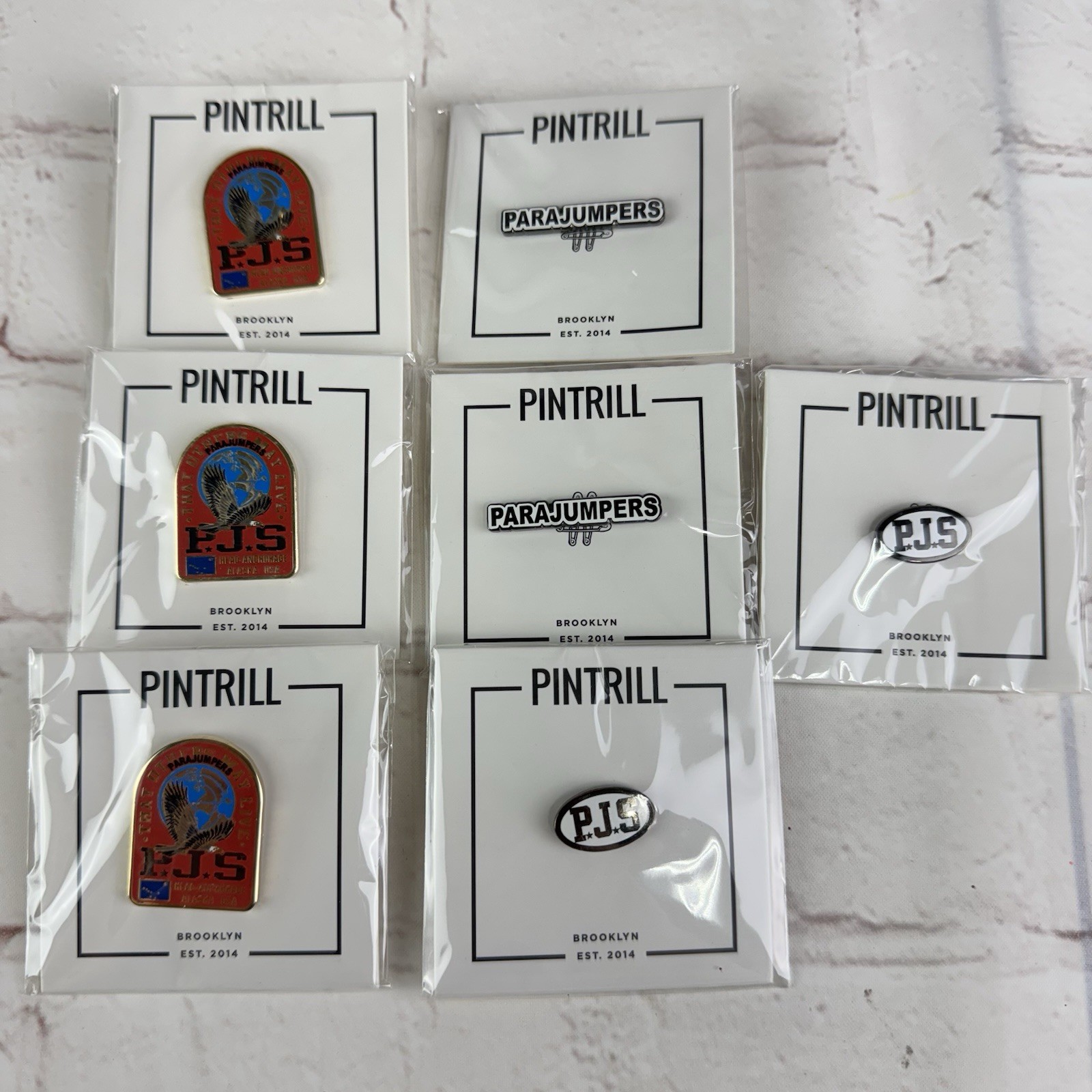 Lot of 7 Pintrill x Parajumpers PJS Pins
