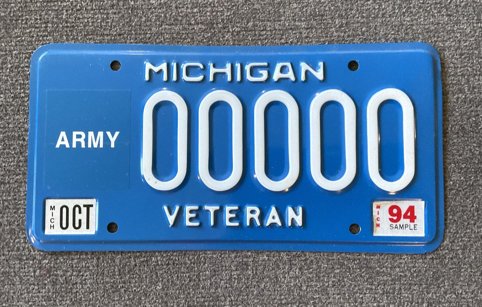 RARE 1994 ARMY MICHIGAN SAMPLE LICENSE PLATE ALL ORIGINAL VETERAN BLUE BASE
