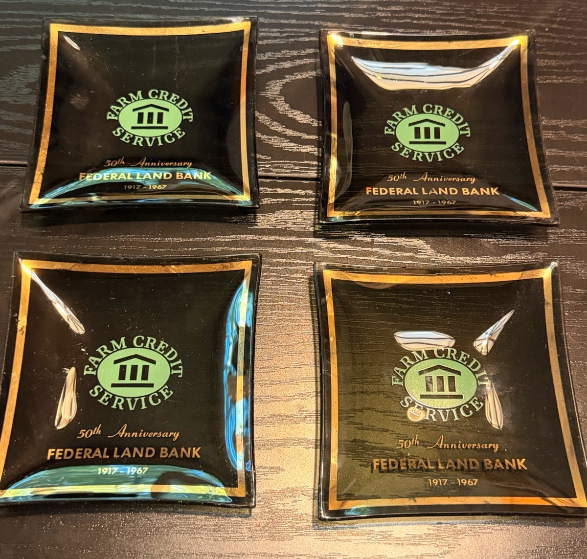 Federal Land Bank Farm Credit Service 1967 Glass Ashtray Set Black Gold  4 pcs