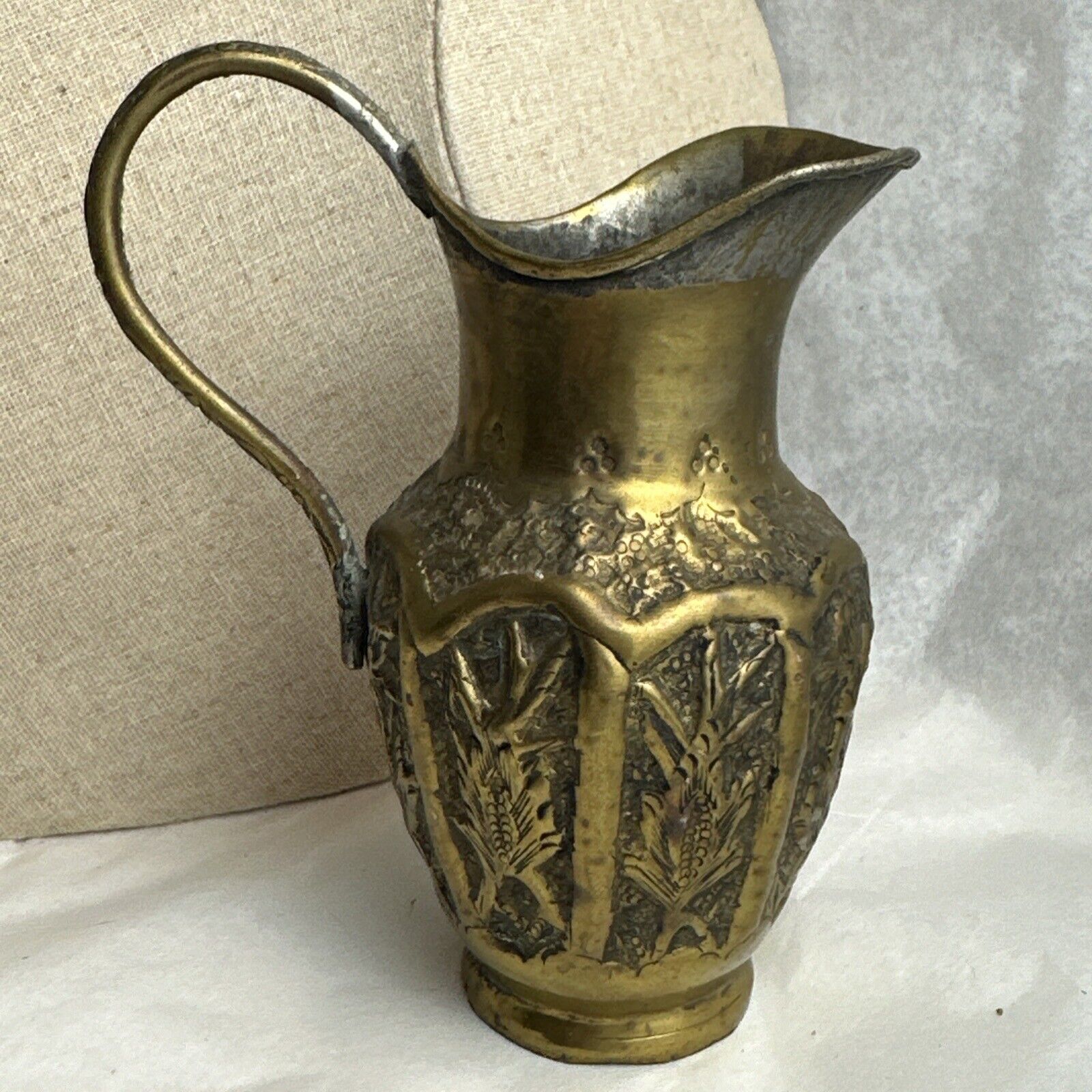 Antique handcrafted gold toned brass pitcher