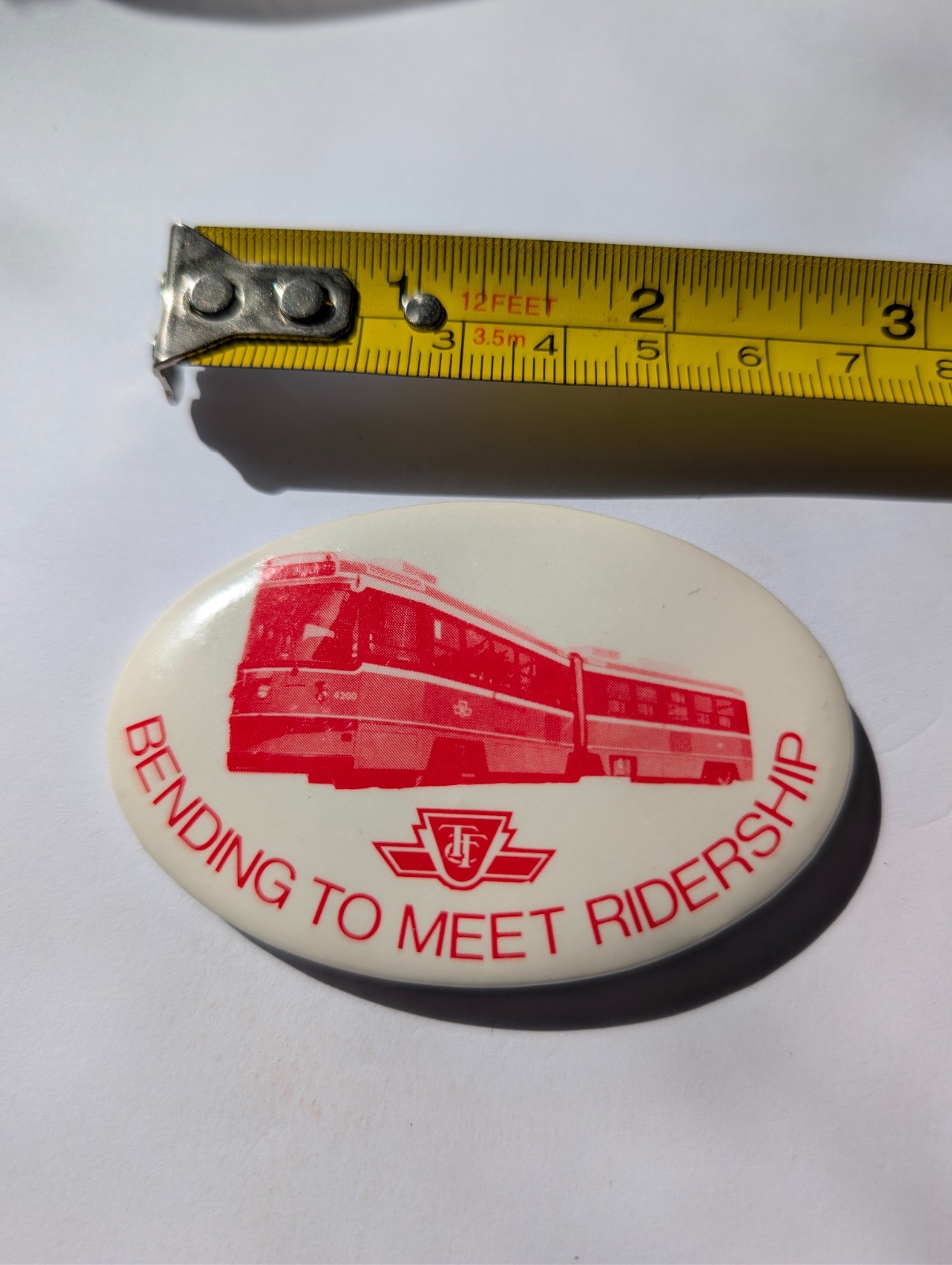 Vintage Pin Pinback Button Bending To Meet Ridership TTC Toronto Street Car