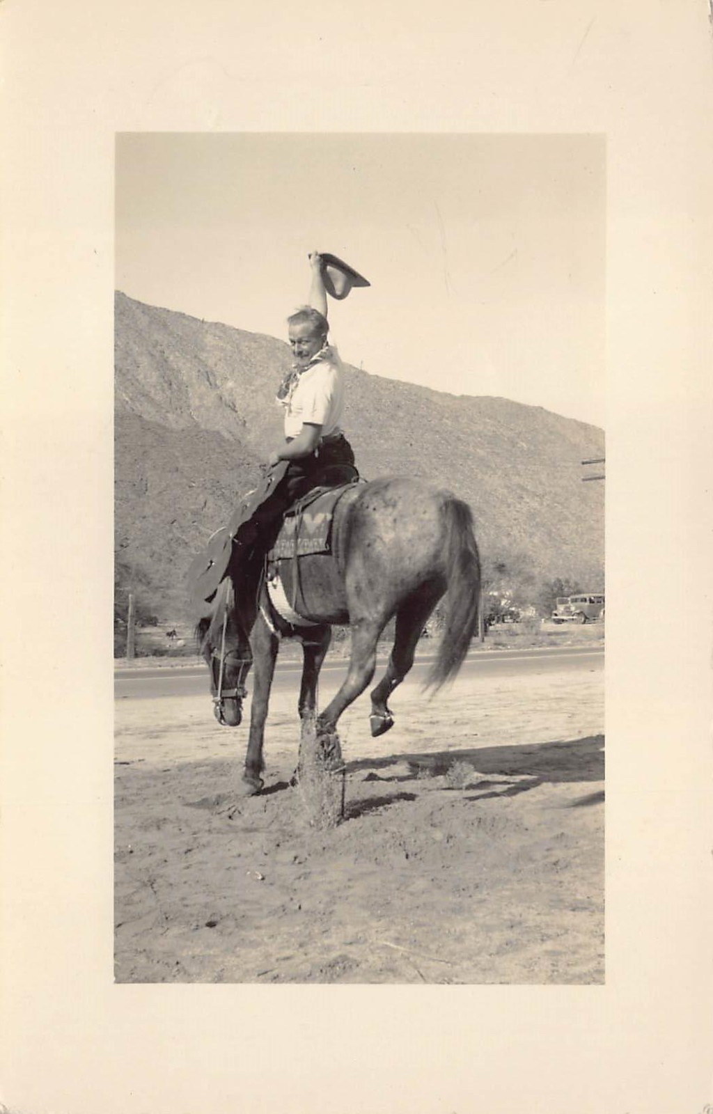 RPPC 1937 Cowboy Riding Bucking Horse 1930s Postcard Man Hat Saddle Midair Dirt