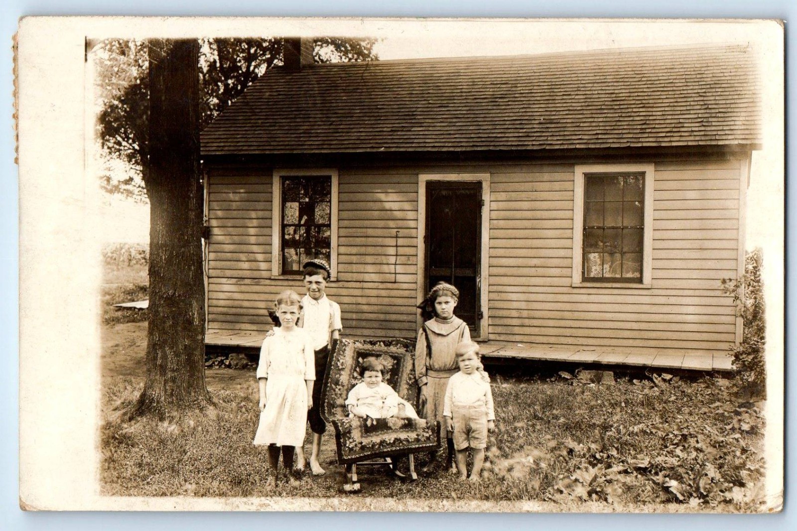 1915 Children Baby Sitting On Chair Minonk Illinois IL RPPC Photo Postcard