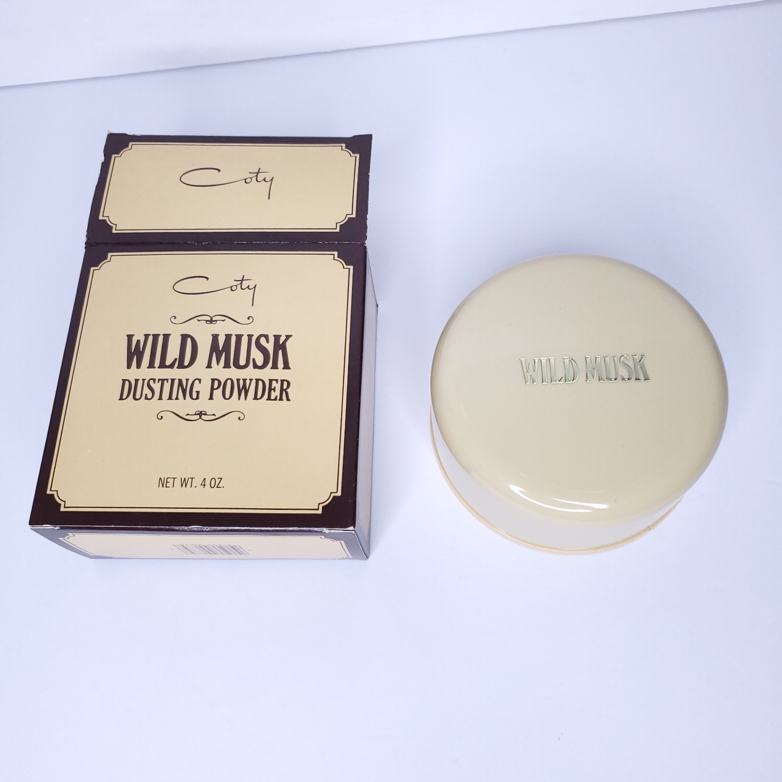Vintage COTY Wild Musk Dusting Body Powder 4 oz With Puff New Old Stock With Box
