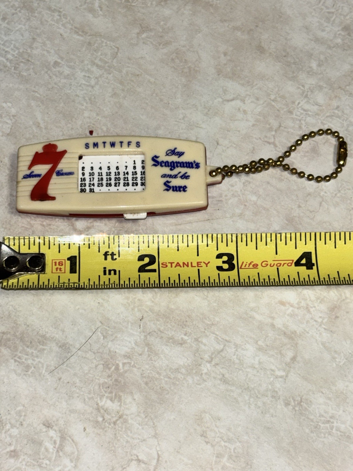 VINTAGE SEAGRAM’S 7 CROWN WHISKEY PLASTIC CALENDAR KEYCHAIN USA MADE