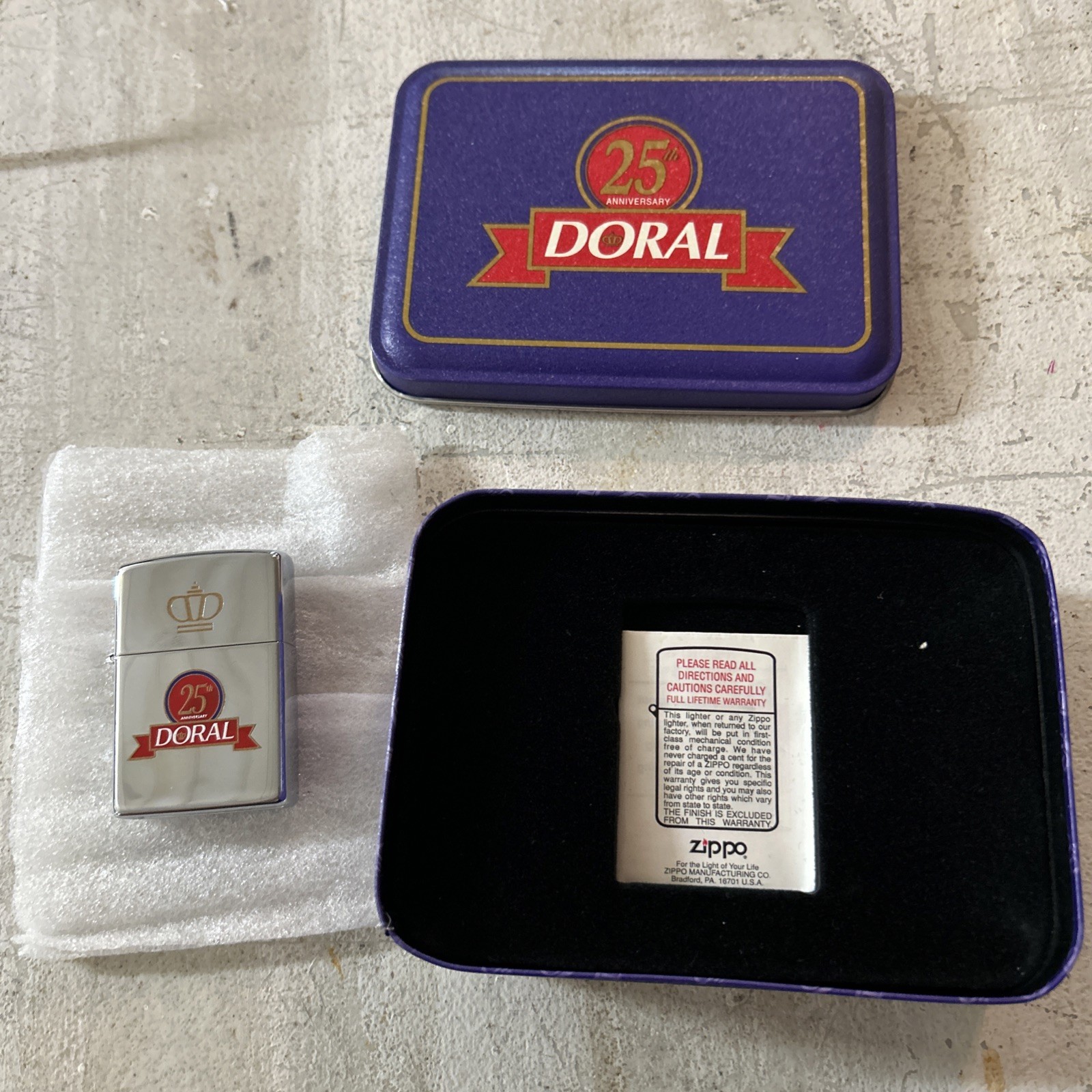 ZIPPO 25th ANNIVERSARY DORAL LIGHTER NEVER USED IN BOX D7 ZIPPO 25th ANNIVERSARY DORAL LIGHTER NEVER USED IN BOX D7