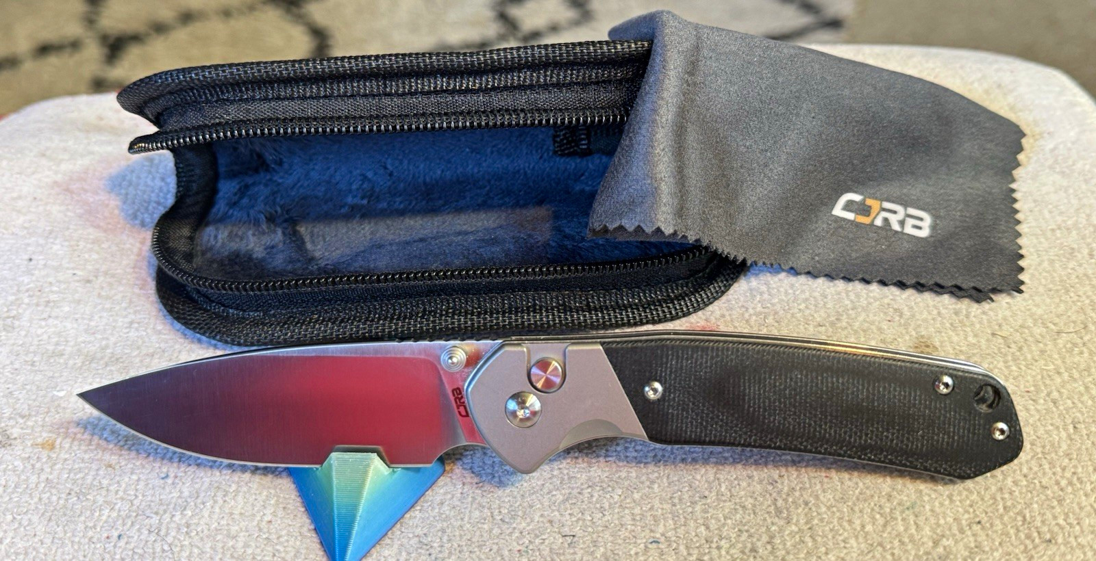 CJRB Pyrite Titanium Bolsters and Pocket Clip. Knife Center  Exclusive