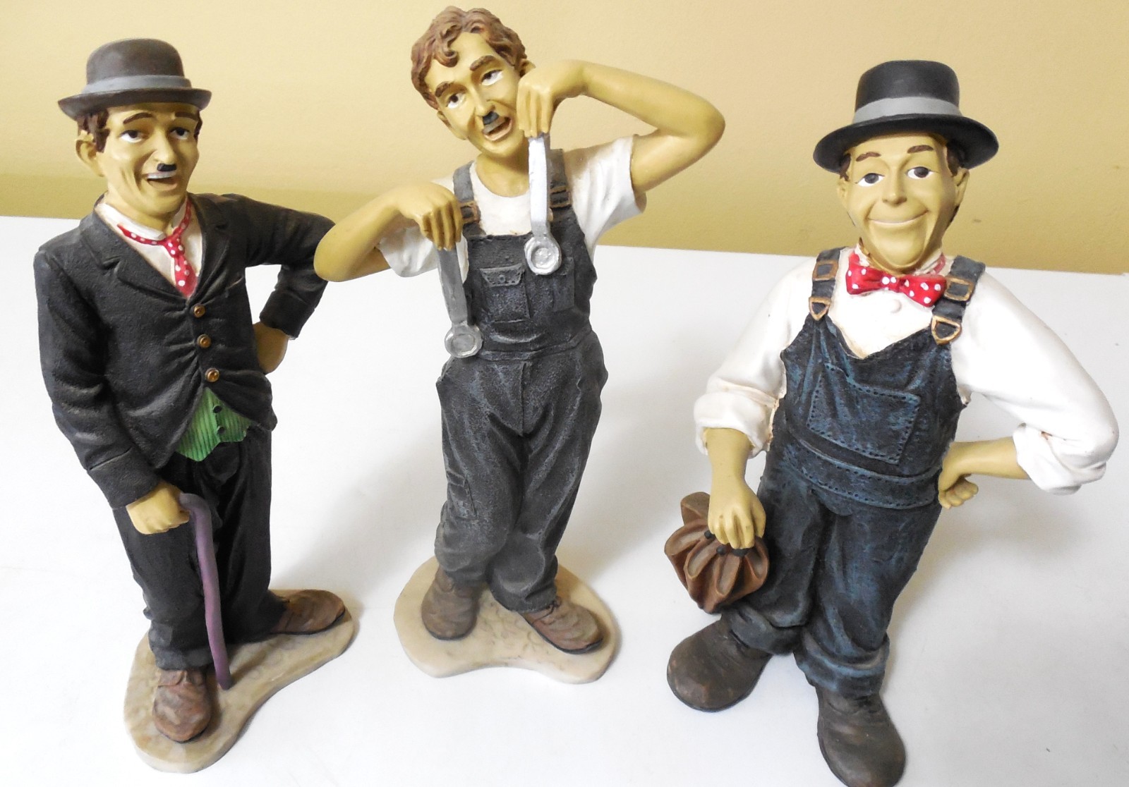 Three Charlie Chaplin figures - excellent shape - pewter? 9.5