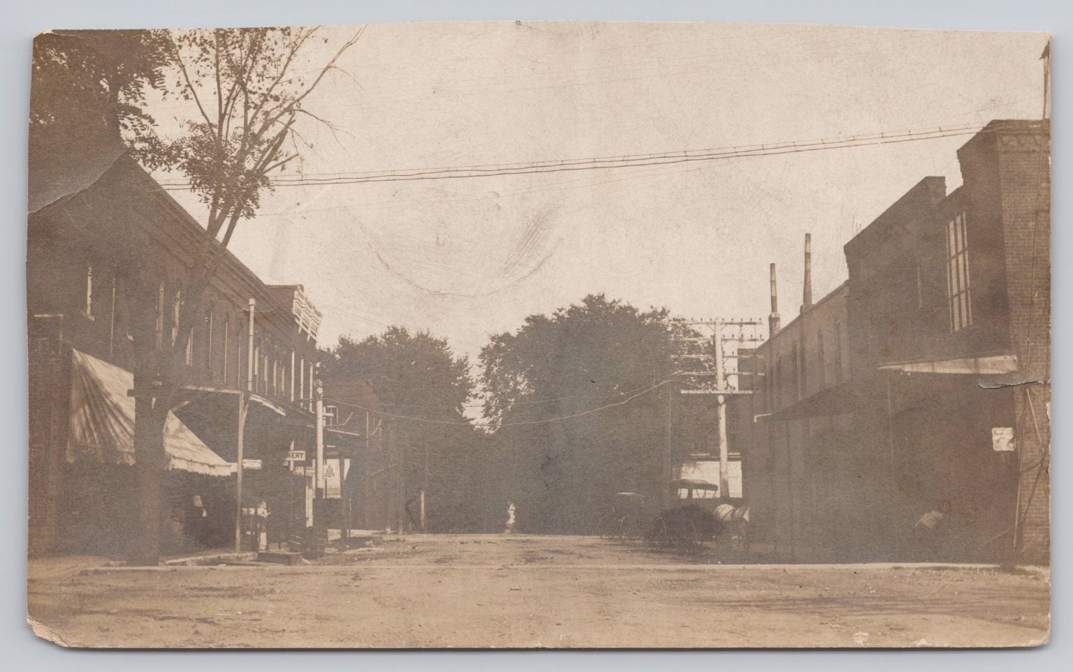 1903 Trenton Missouri Main Street RPPC Postcard - Dirt Road & Buildings