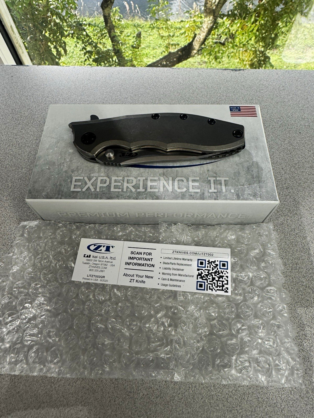 Zero Tolerance ZT 0562 Titanium Frame Lock Drop Point Plain Edge 2026