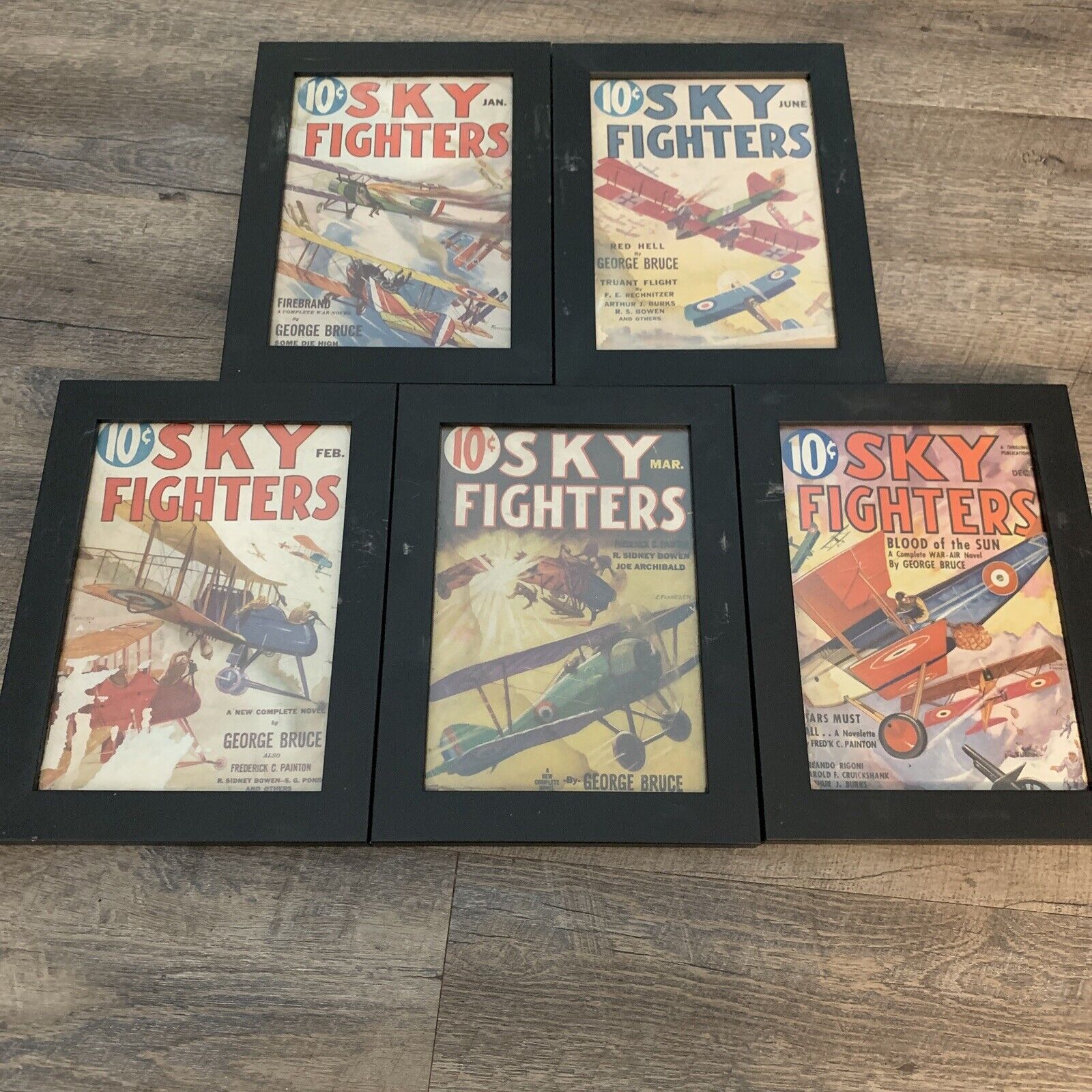 5 professionally framed SKY FIGHTERS comic books