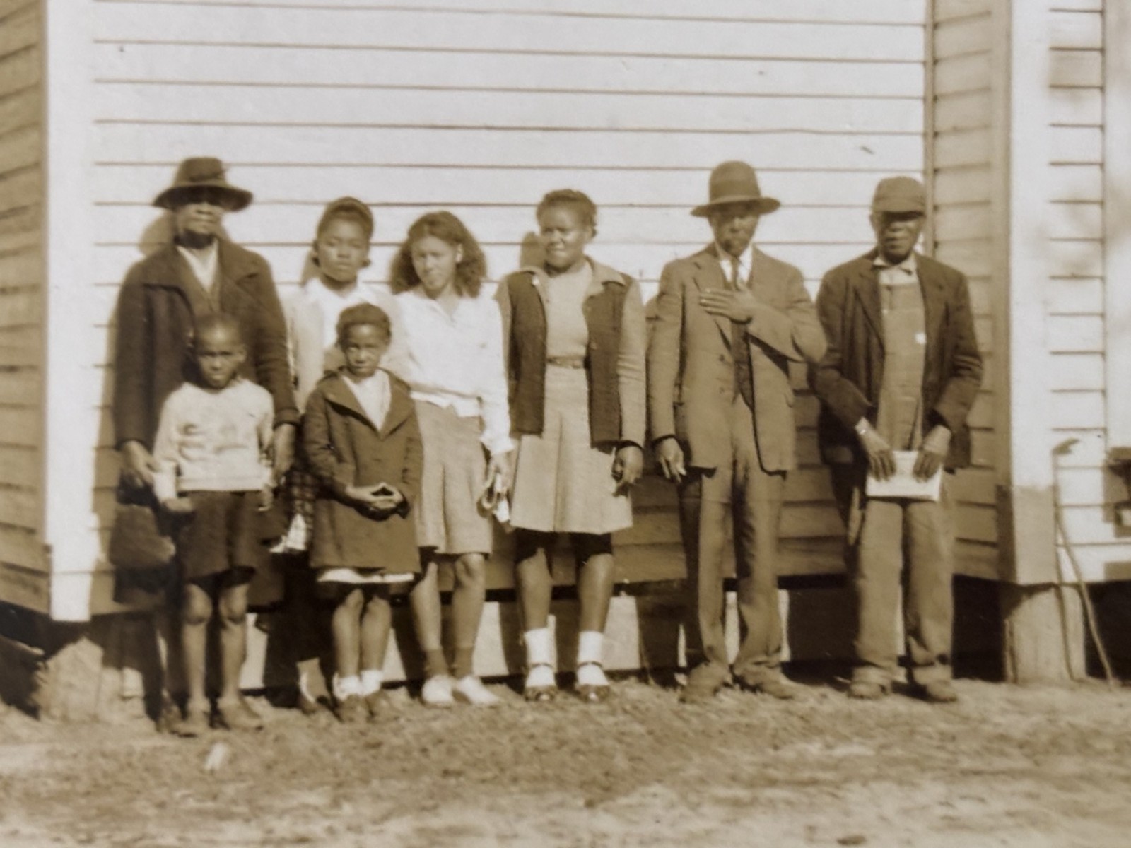 2  vintage photos of an African American family and a couple
