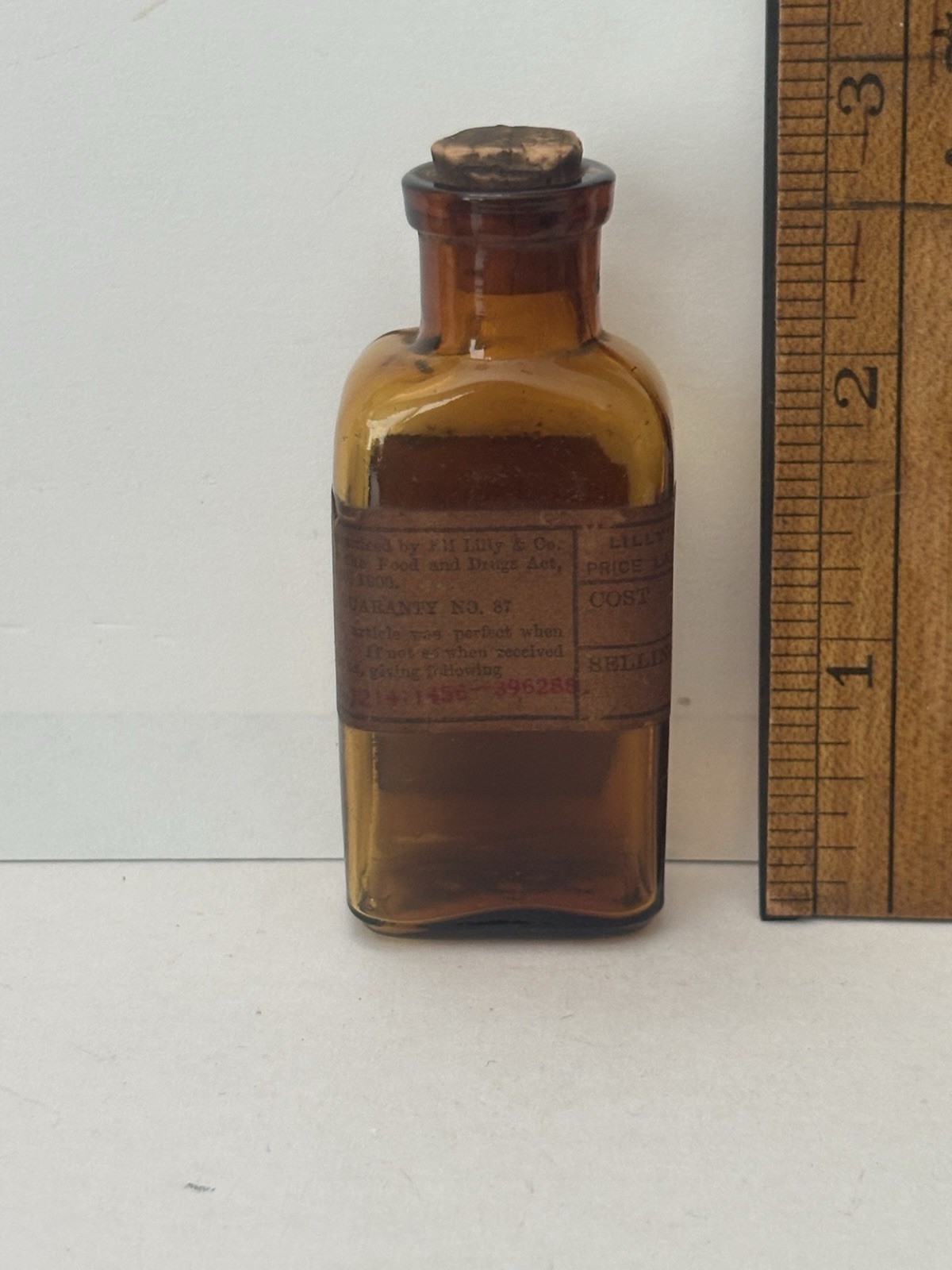 Antique Eli Lilly  Medicine Bottle Original Label & Cork 