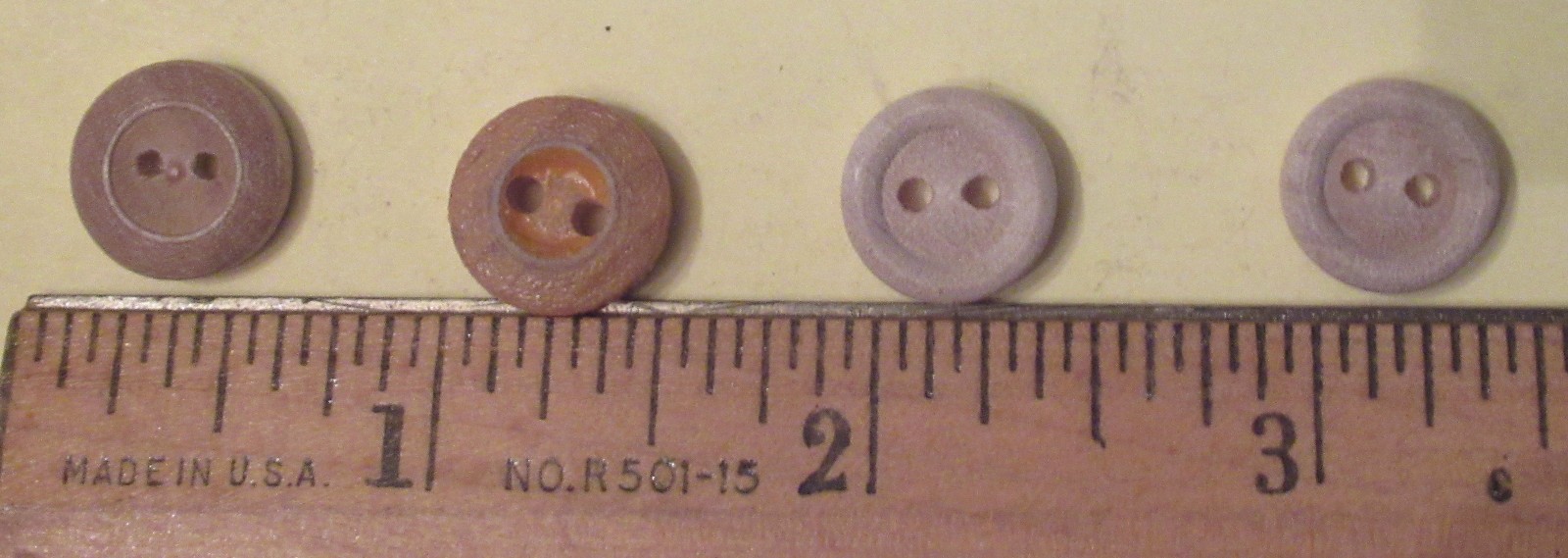 Lot of four vintage wooden Hawaiian shirt buttons