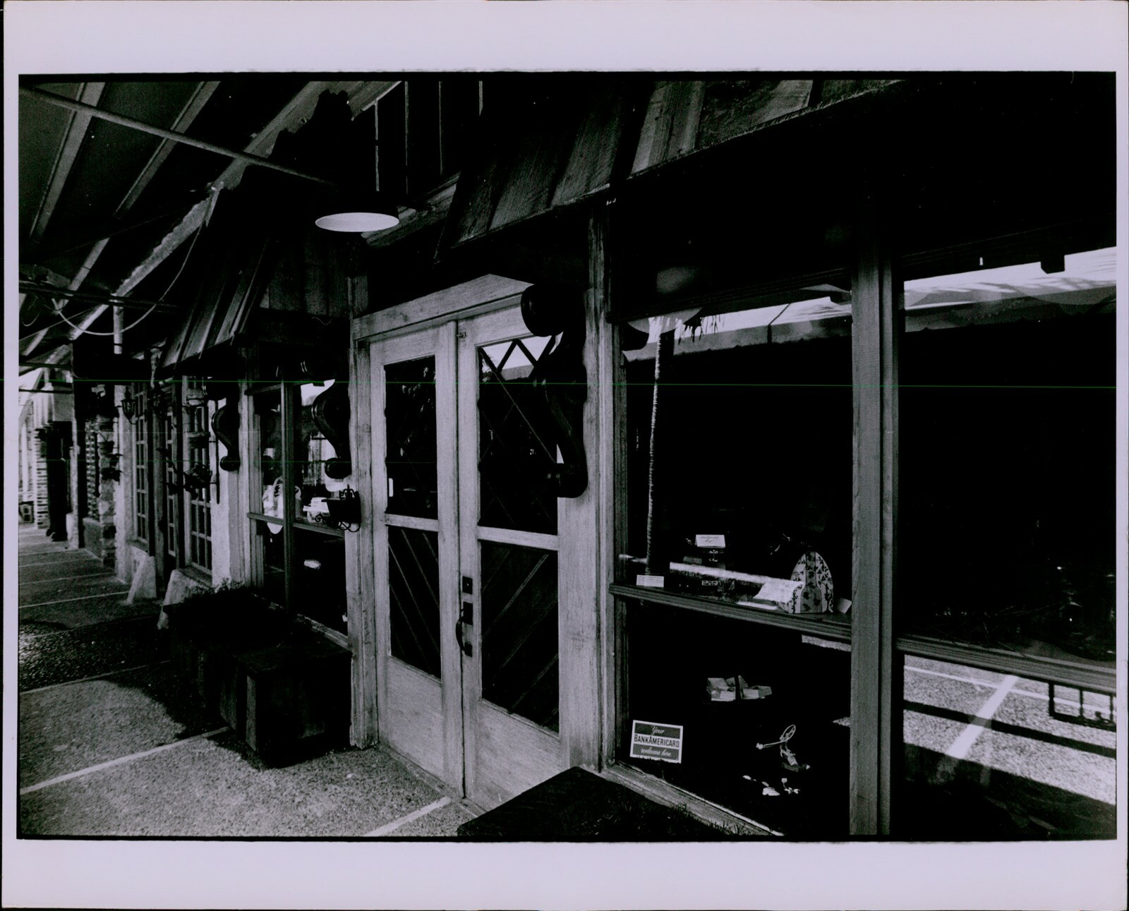 LG862 Original Tom Mosier Photo BUSINESS ENTRANCE Dark Favcade Bars Doors View